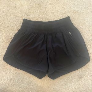 Lululemon black running shorts. Size 6. Never worn.
